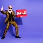 An excited older man loyal to a company because of a corporate strategy